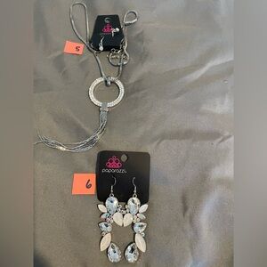 Necklace and earrings sold separately